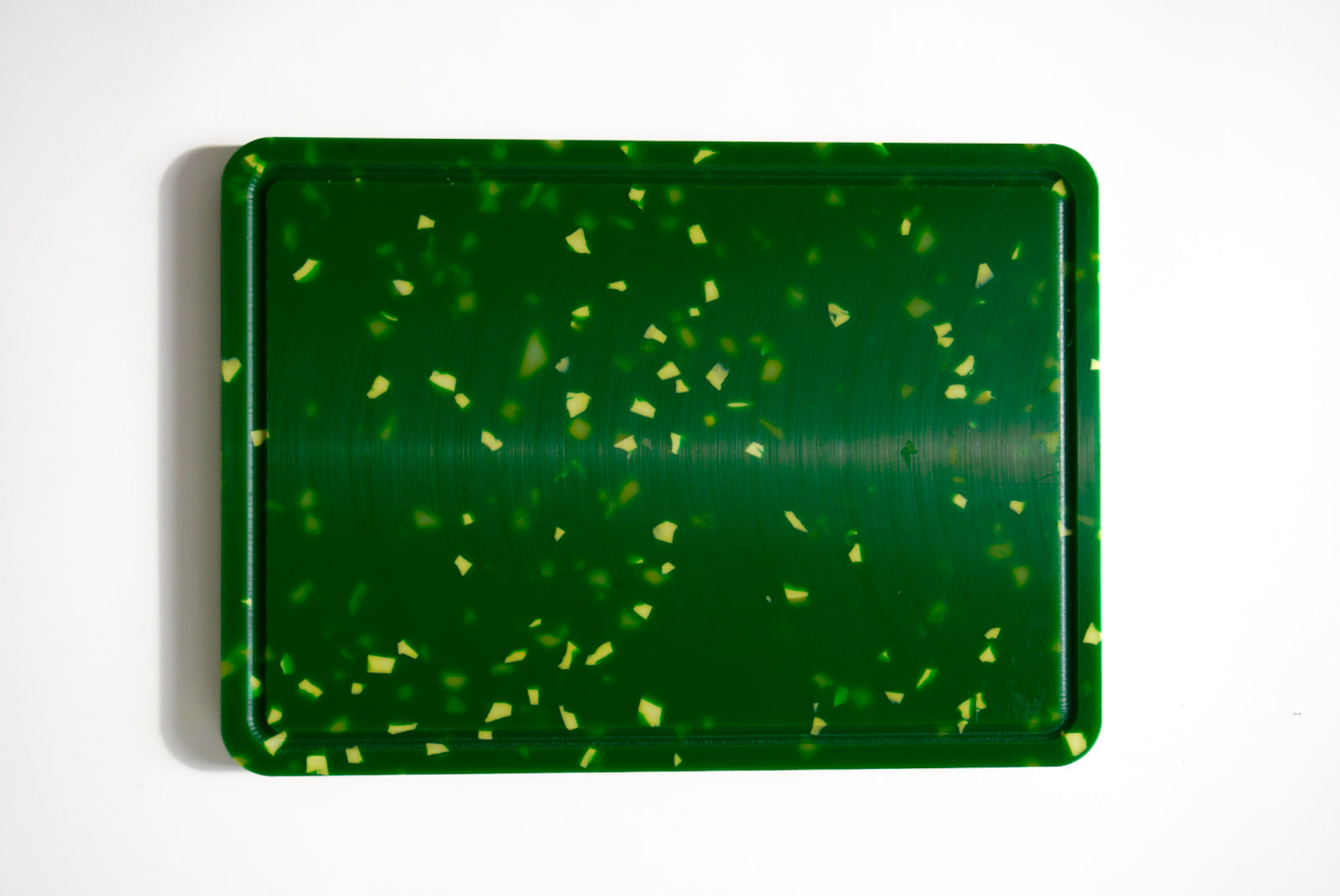 Green speckles chopping board