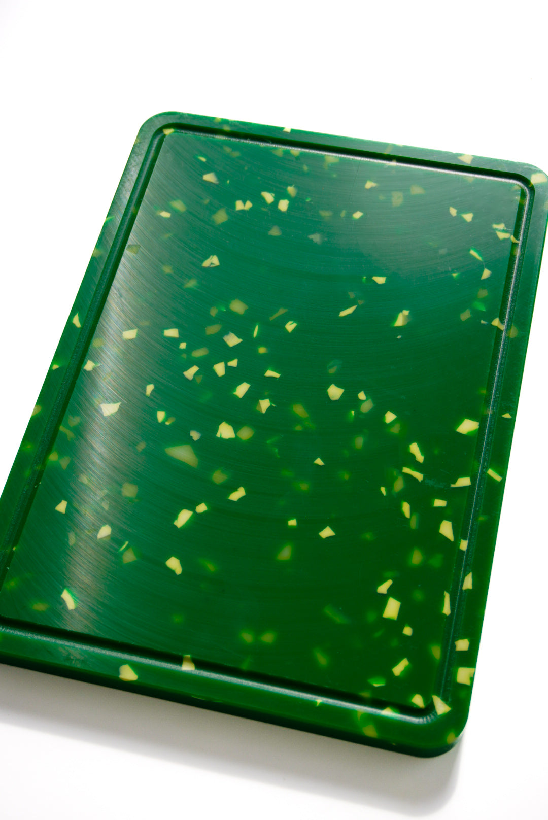 Green speckles chopping board