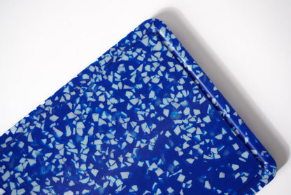Blue and white speckled chopping board